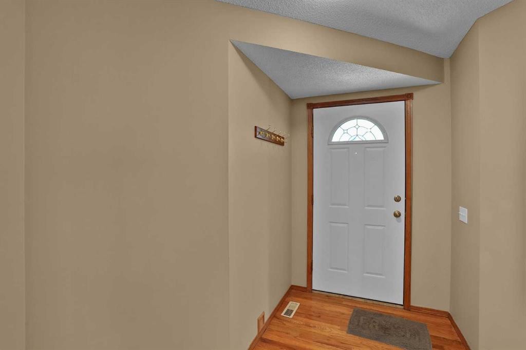 62 West Mitford Crescent, Cochrane, AB - Indoor Photo Showing Other Room