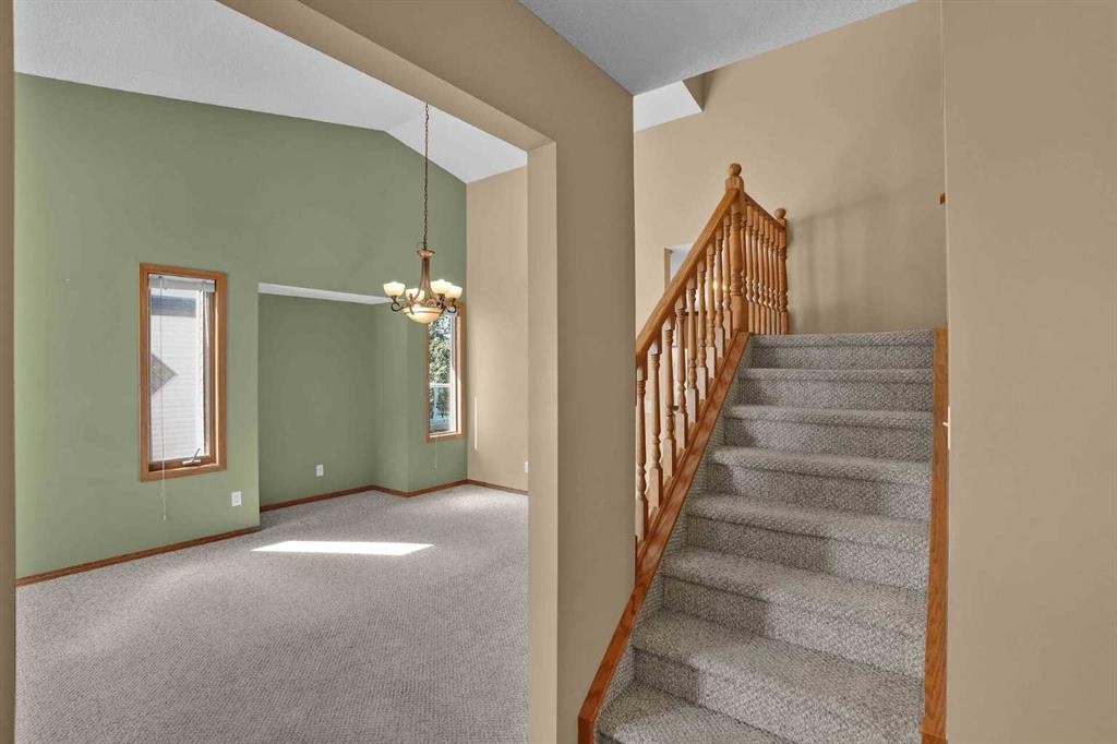 62 West Mitford Crescent, Cochrane, AB - Indoor Photo Showing Other Room