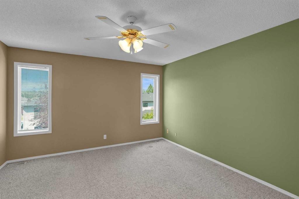 62 West Mitford Crescent, Cochrane, AB - Indoor Photo Showing Other Room