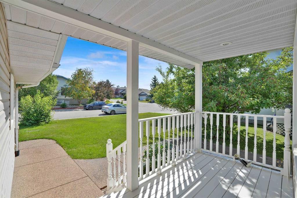 62 West Mitford Crescent, Cochrane, AB - Outdoor With Deck Patio Veranda With Exterior