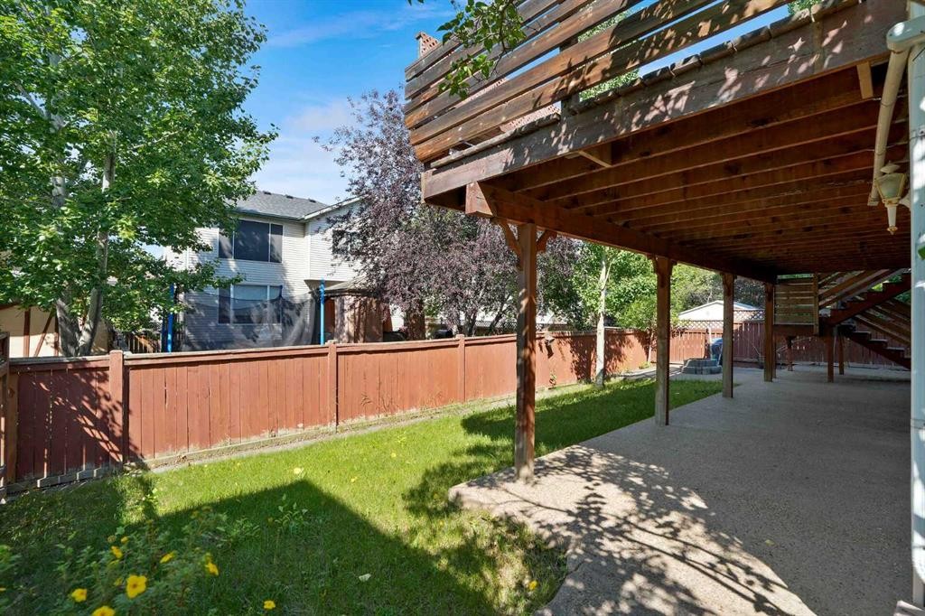 62 West Mitford Crescent, Cochrane, AB - Outdoor With Deck Patio Veranda