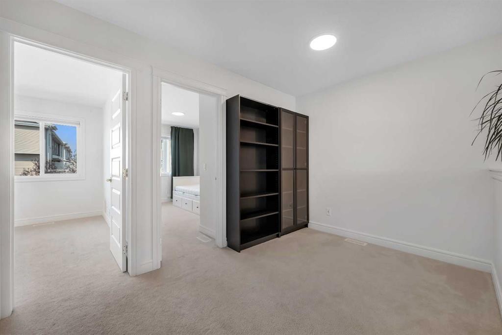 250 Carrington Gate Nw, Calgary, AB - Indoor Photo Showing Other Room