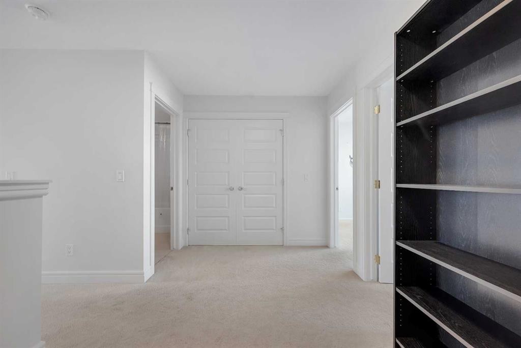 250 Carrington Gate Nw, Calgary, AB - Indoor Photo Showing Other Room