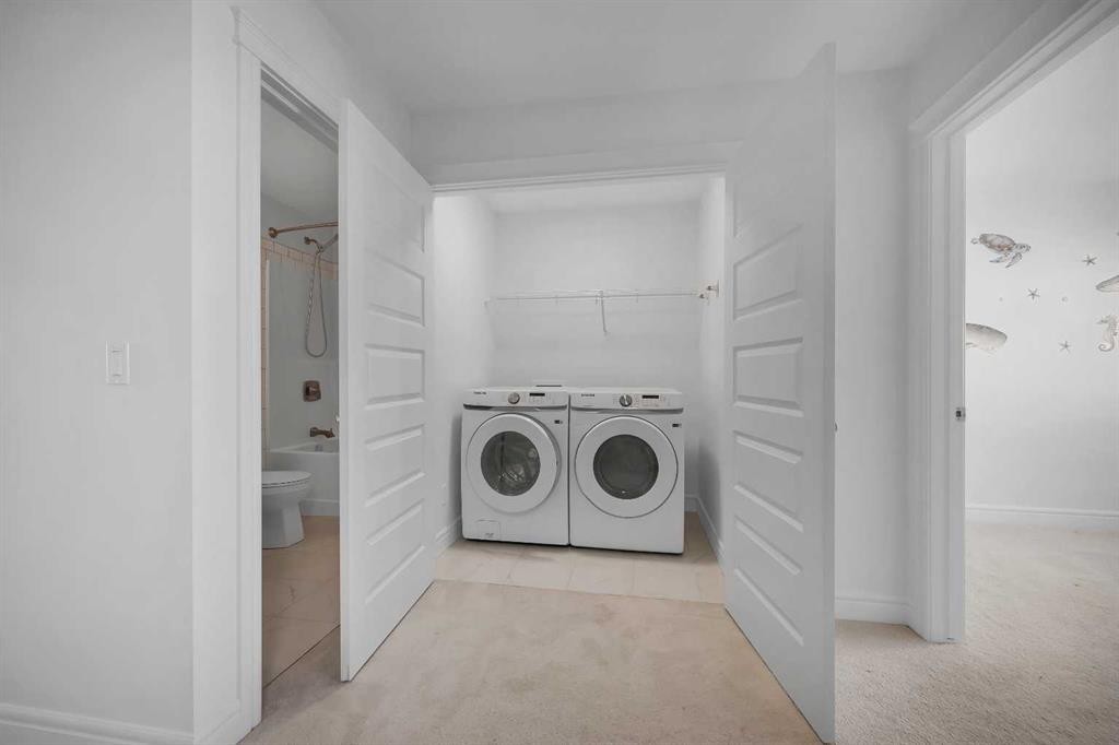 250 Carrington Gate Nw, Calgary, AB - Indoor Photo Showing Laundry Room