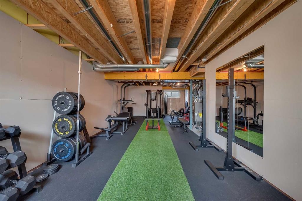 250 Carrington Gate Nw, Calgary, AB - Indoor Photo Showing Gym Room