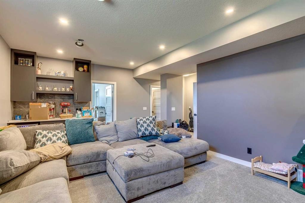 168 Rainbow Falls Heath, Chestermere, AB - Indoor Photo Showing Living Room