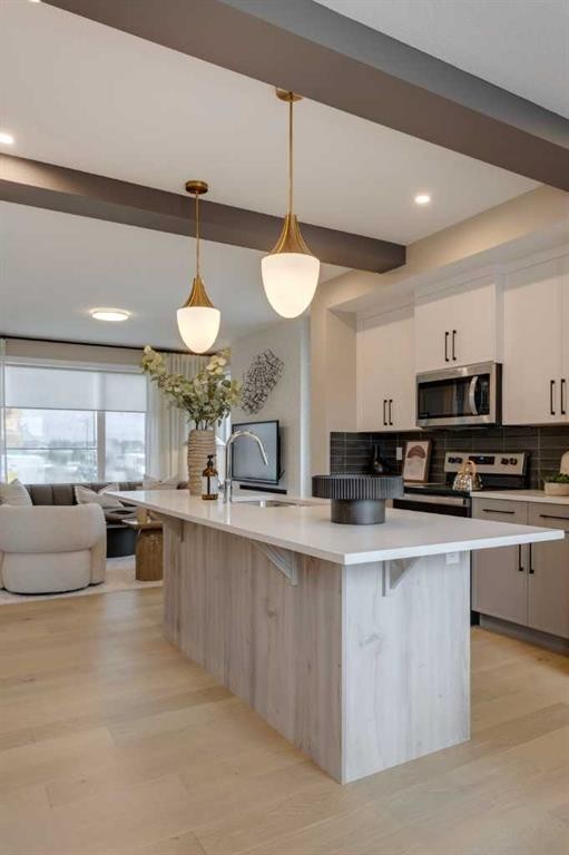 189 Cobblestone Gate Sw, Airdrie, AB - Indoor Photo Showing Kitchen