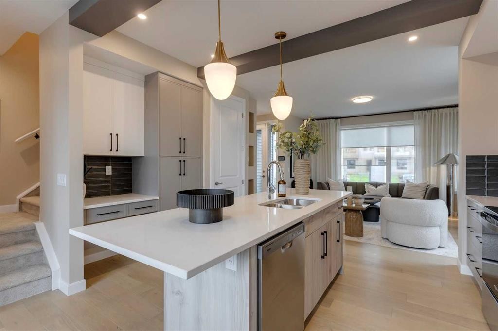 189 Cobblestone Gate Sw, Airdrie, AB - Indoor Photo Showing Kitchen With Double Sink With Upgraded Kitchen