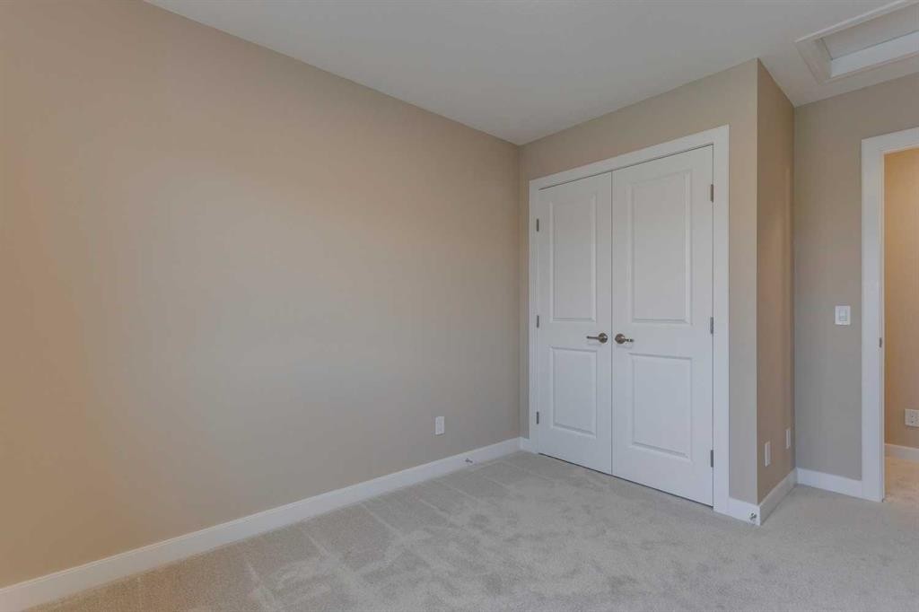 189 Cobblestone Gate Sw, Airdrie, AB - Indoor Photo Showing Other Room