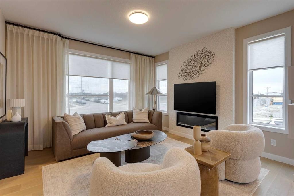 189 Cobblestone Gate Sw, Airdrie, AB - Indoor Photo Showing Living Room