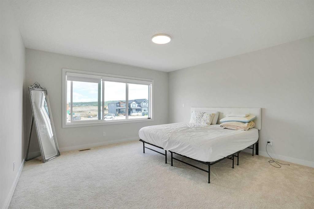 101 Wolf Hollow Terrace Se, Calgary, AB - Indoor Photo Showing Bedroom