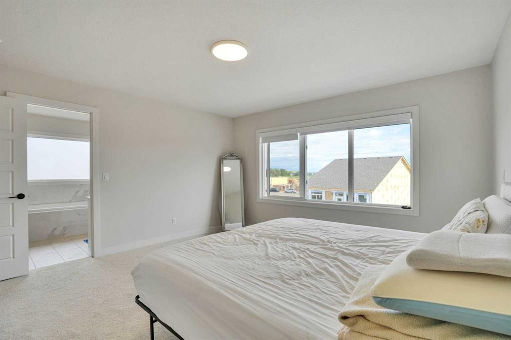 101 Wolf Hollow Terrace Se, Calgary, AB - Indoor Photo Showing Bedroom