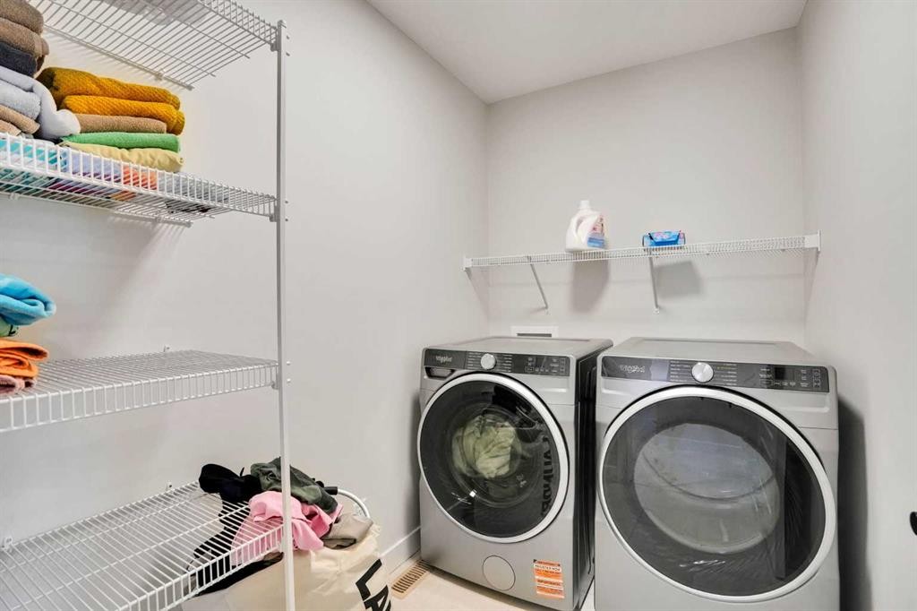 101 Wolf Hollow Terrace Se, Calgary, AB - Indoor Photo Showing Laundry Room