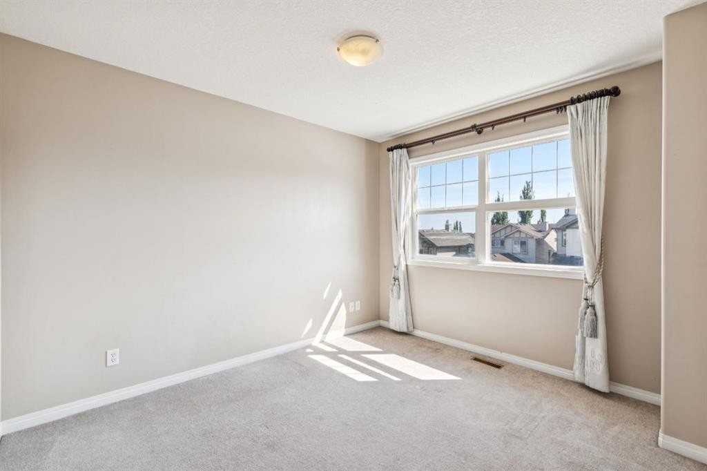 91 St Moritz Terrace Sw, Calgary, AB - Indoor Photo Showing Other Room