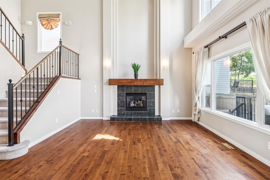 91 St Moritz Terrace Sw, Calgary, AB - Indoor With Fireplace