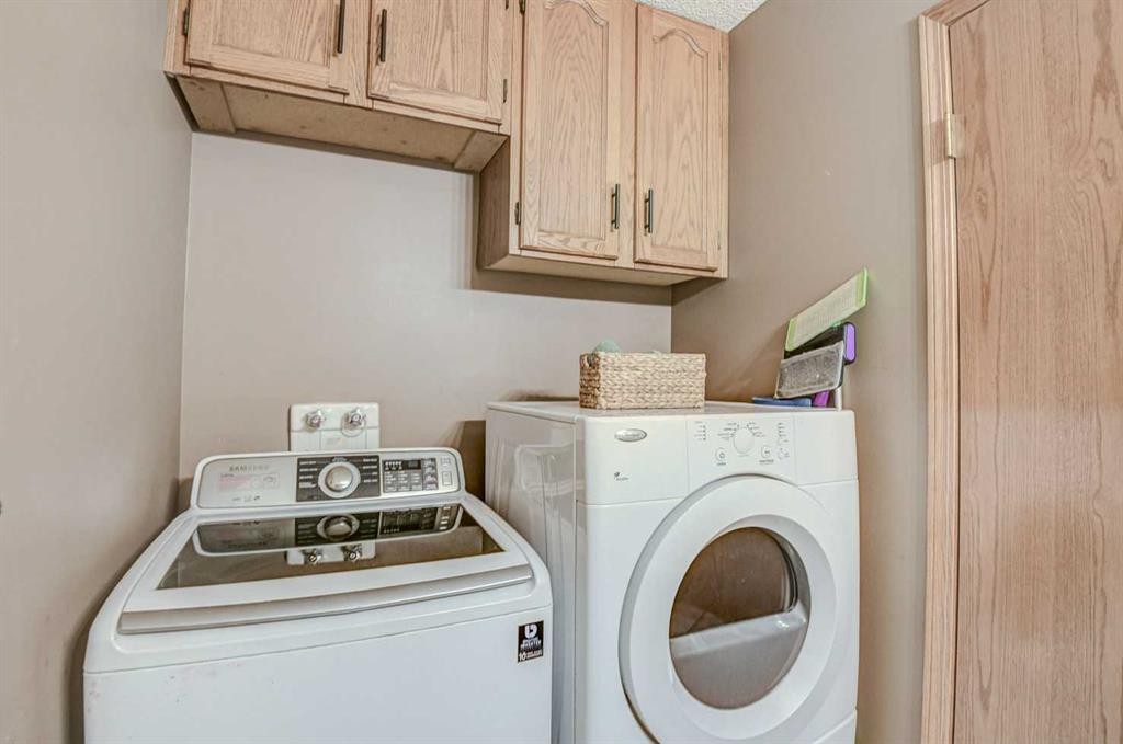124 Del Ray Close Ne, Calgary, AB - Indoor Photo Showing Laundry Room