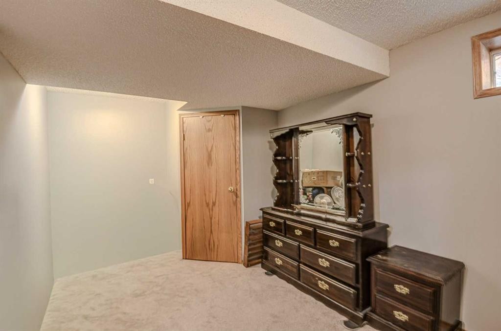 124 Del Ray Close Ne, Calgary, AB - Indoor Photo Showing Other Room