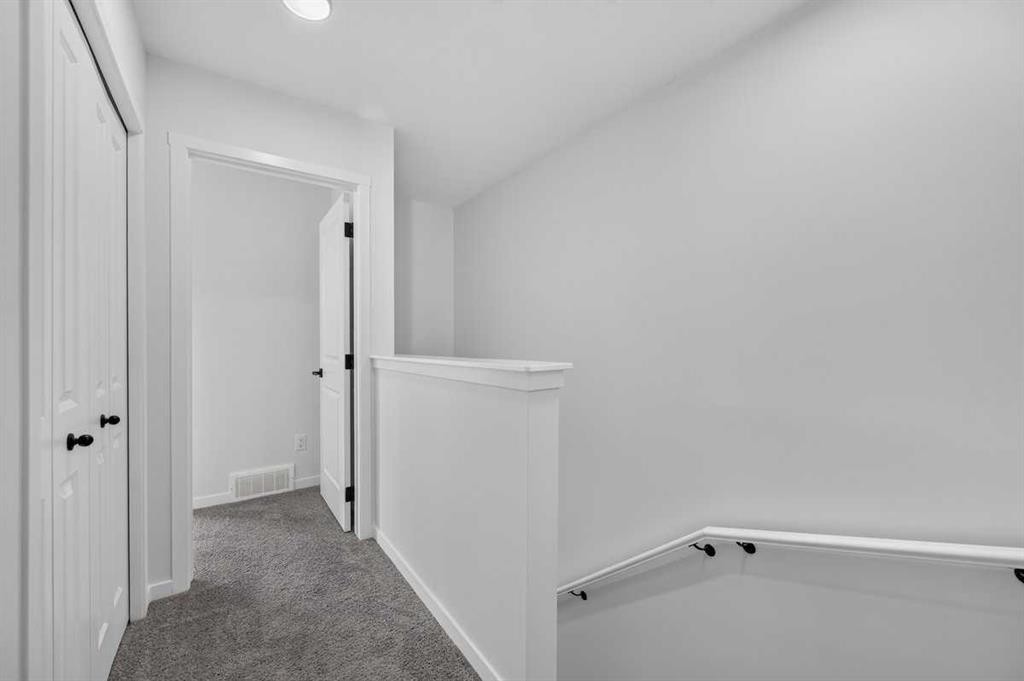 401-81 Midtown Boulevard Sw, Airdrie, AB - Indoor Photo Showing Other Room
