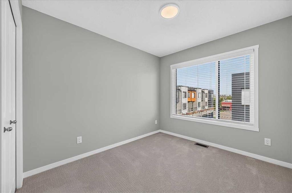 401-81 Midtown Boulevard Sw, Airdrie, AB - Indoor Photo Showing Other Room