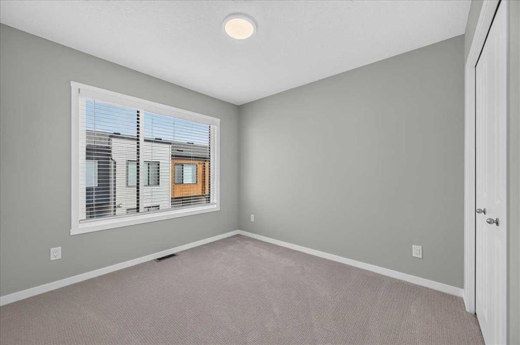 401-81 Midtown Boulevard Sw, Airdrie, AB - Indoor Photo Showing Other Room