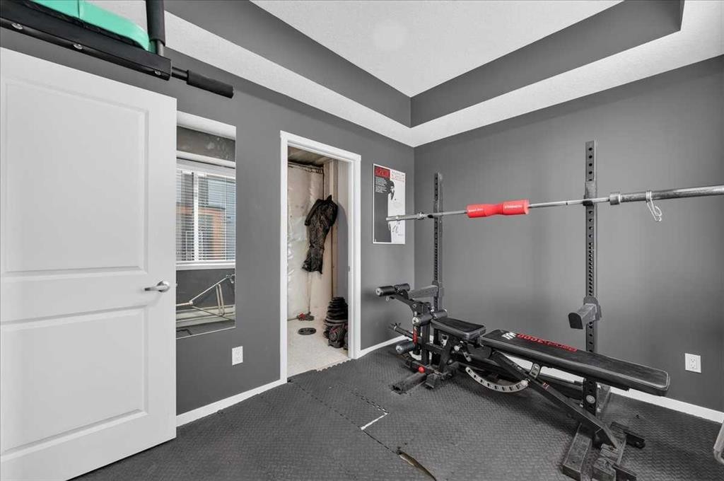 401-81 Midtown Boulevard Sw, Airdrie, AB - Indoor Photo Showing Gym Room