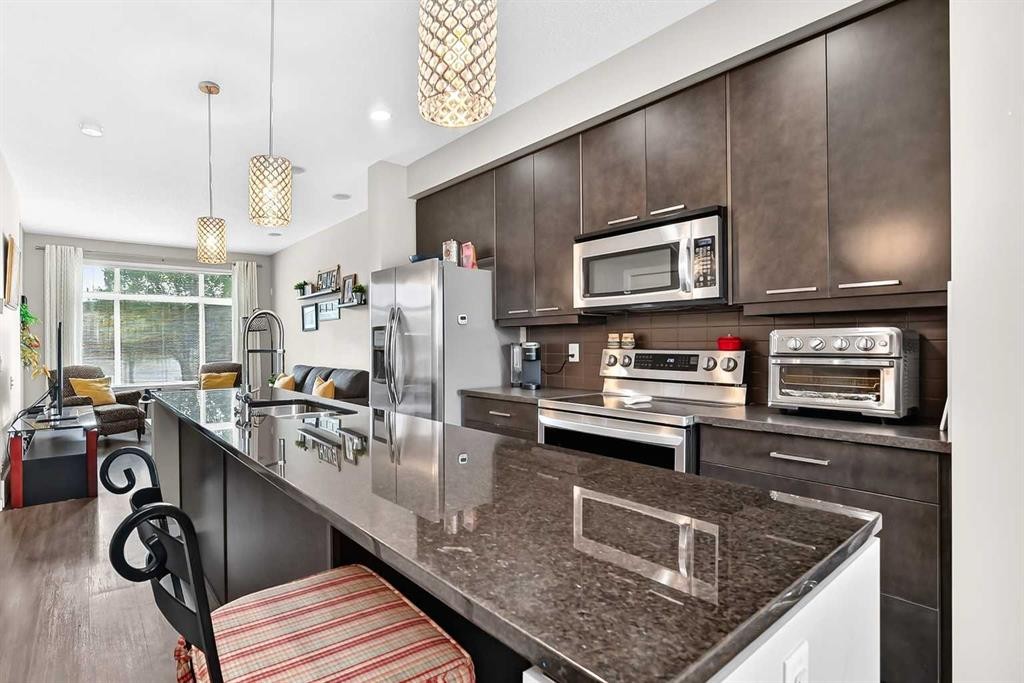 1915 Copperfield Boulevard Se, Calgary, AB - Indoor Photo Showing Kitchen With Upgraded Kitchen