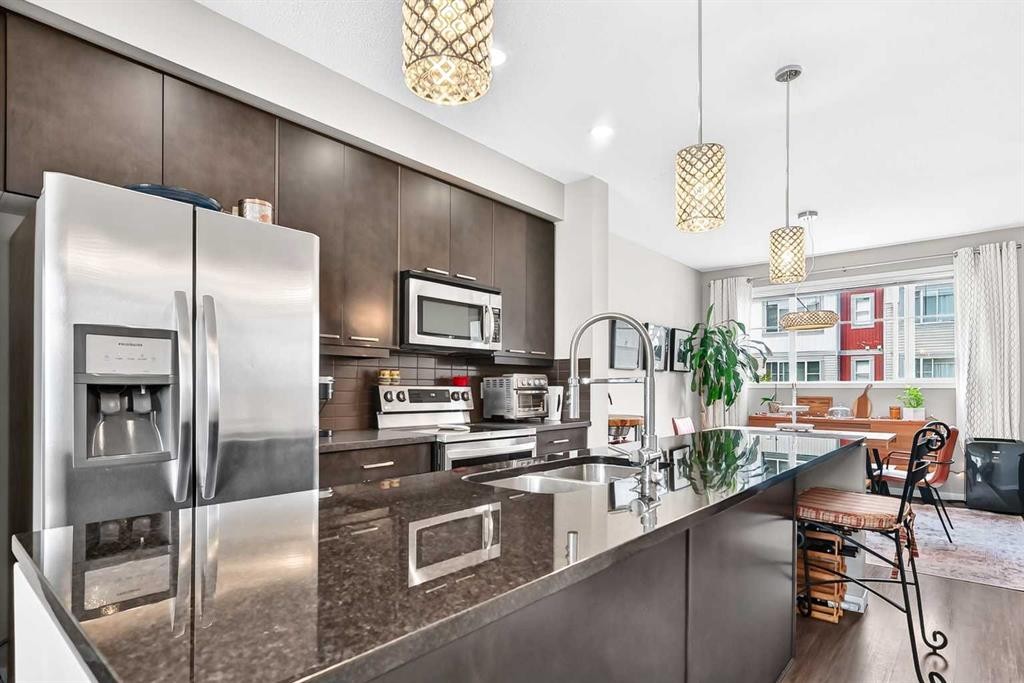 1915 Copperfield Boulevard Se, Calgary, AB - Indoor Photo Showing Kitchen With Double Sink With Upgraded Kitchen