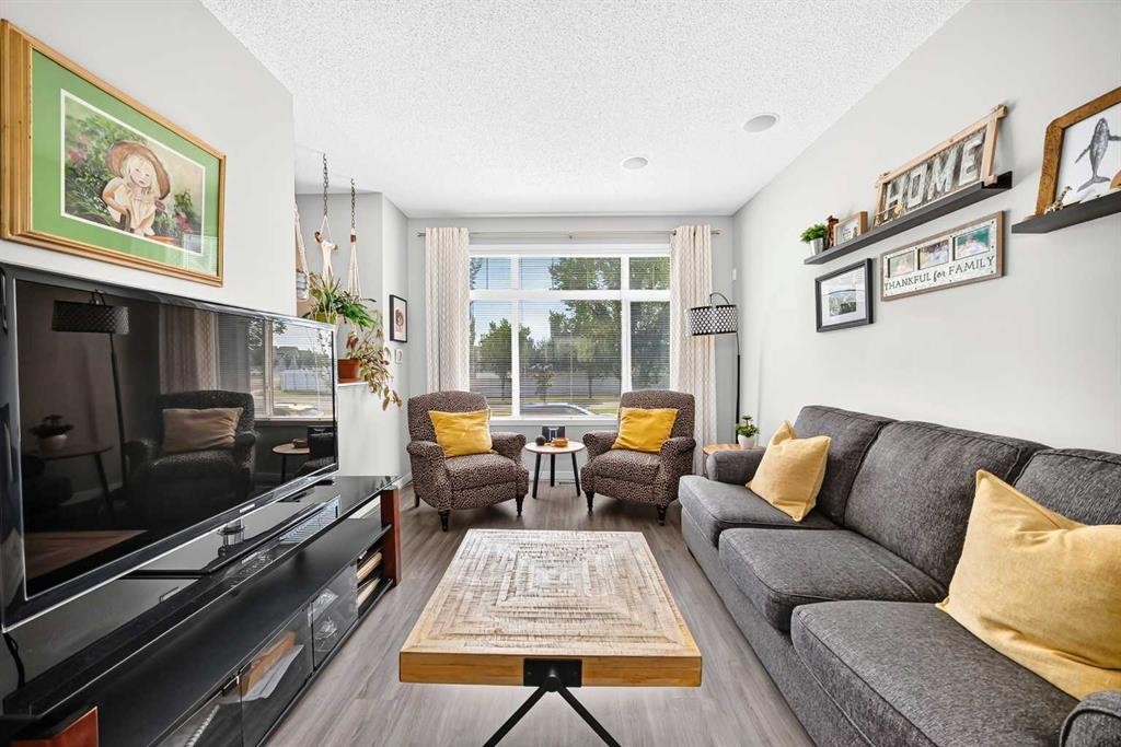 1915 Copperfield Boulevard Se, Calgary, AB - Indoor Photo Showing Living Room
