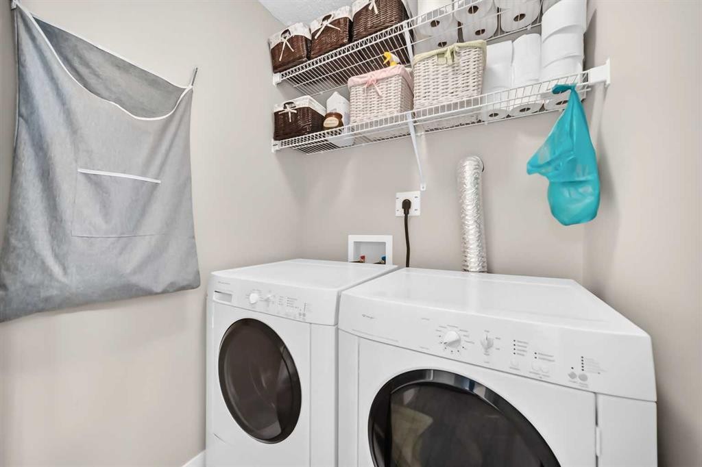 1915 Copperfield Boulevard Se, Calgary, AB - Indoor Photo Showing Laundry Room