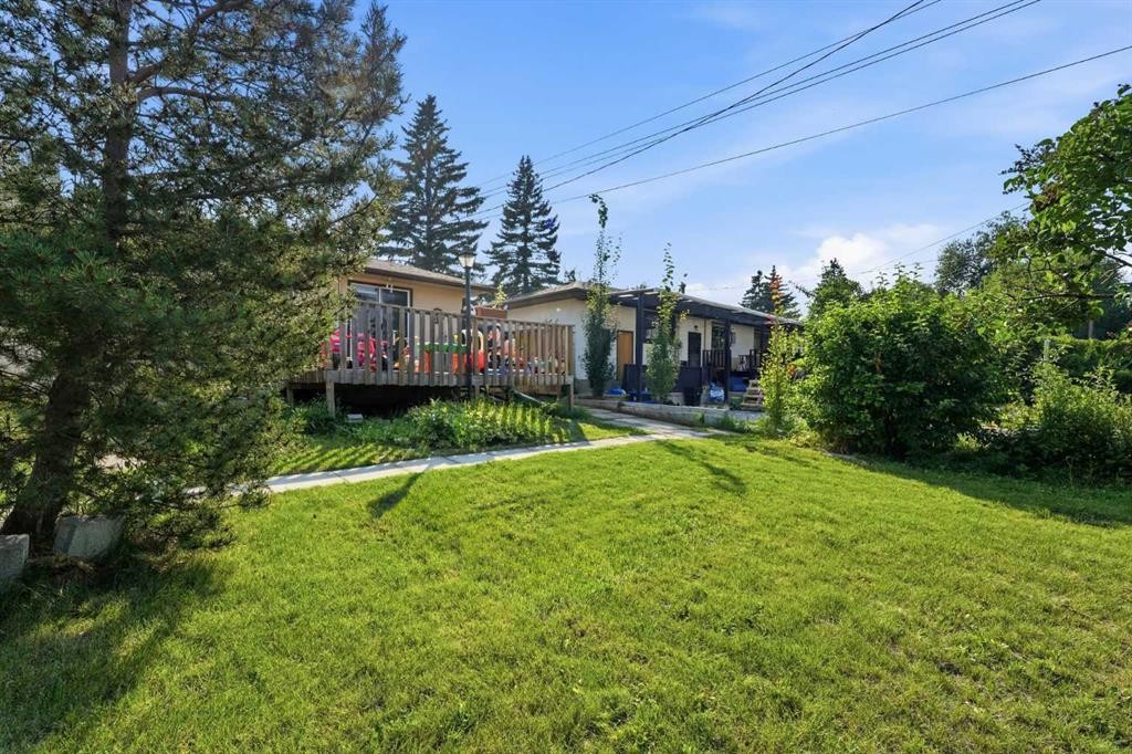 20 Rossburn Crescent Sw, Calgary, AB - Outdoor With Deck Patio Veranda