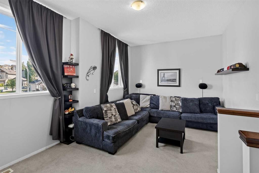 288 Evansbrooke Way Nw, Calgary, AB - Indoor Photo Showing Living Room