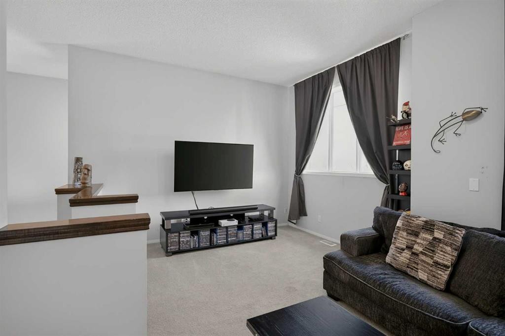 288 Evansbrooke Way Nw, Calgary, AB - Indoor Photo Showing Living Room