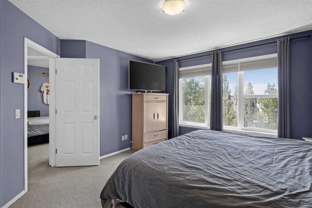 288 Evansbrooke Way Nw, Calgary, AB - Indoor Photo Showing Bedroom