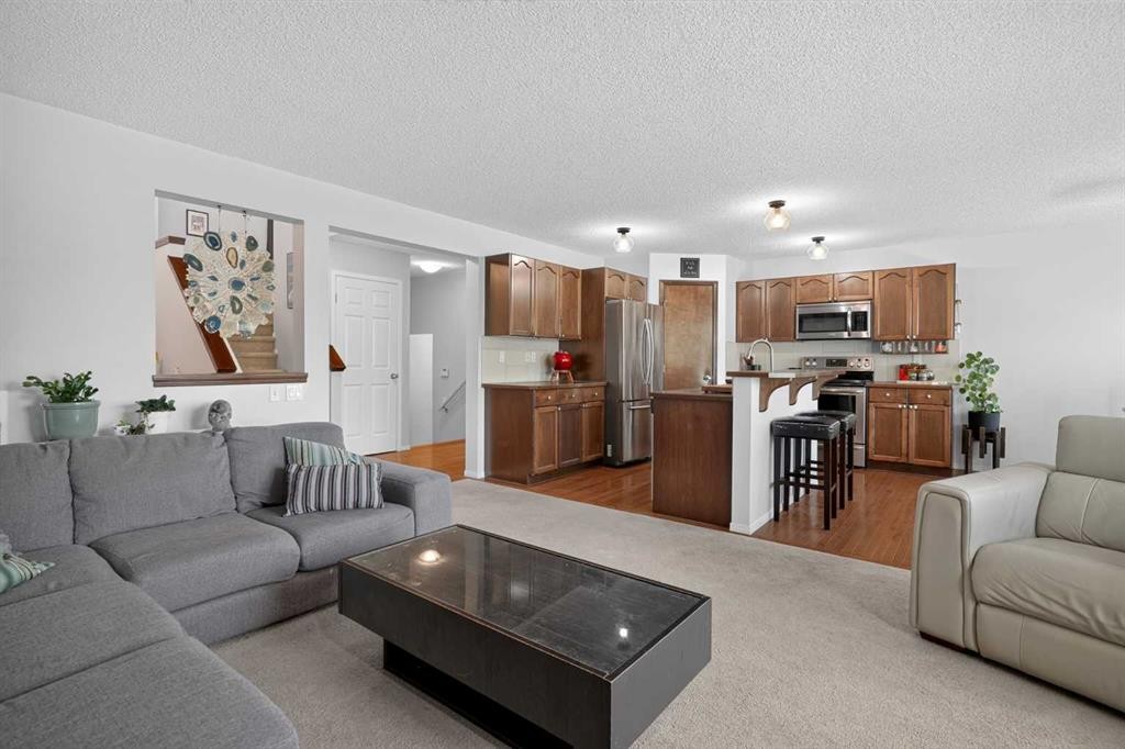 288 Evansbrooke Way Nw, Calgary, AB - Indoor Photo Showing Living Room