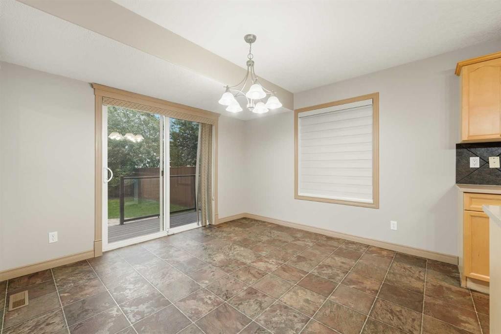 137 Evanscove Circle Nw, Calgary, AB - Indoor Photo Showing Other Room