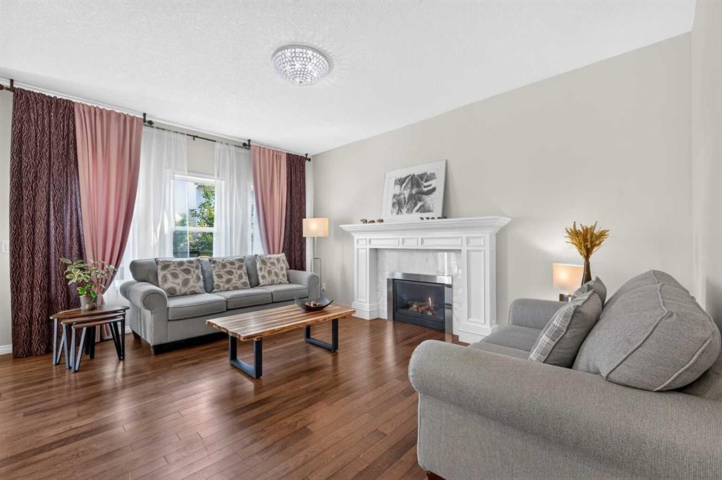 232 Walden Heights Se, Calgary, AB - Indoor Photo Showing Living Room With Fireplace