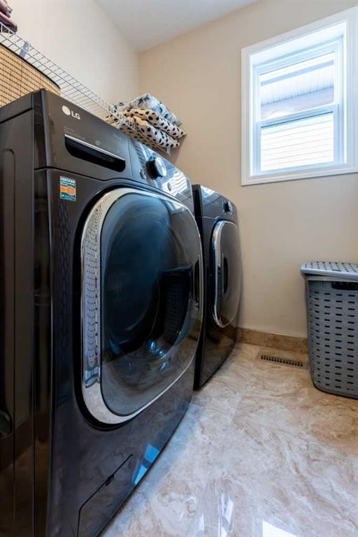232 Walden Heights Se, Calgary, AB - Indoor Photo Showing Laundry Room