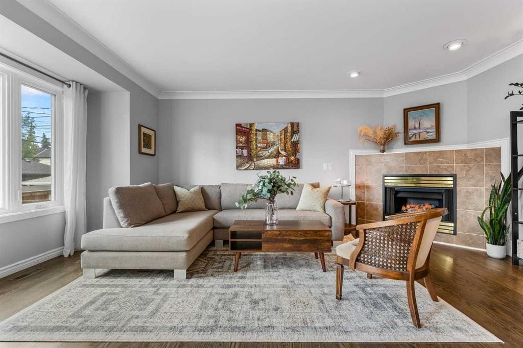 2031 2 Avenue Nw, Calgary, AB - Indoor Photo Showing Living Room With Fireplace