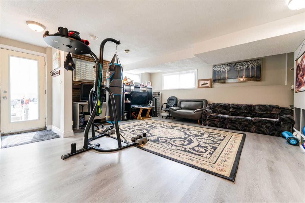 115 Maunsell Close Ne, Calgary, AB - Indoor Photo Showing Gym Room