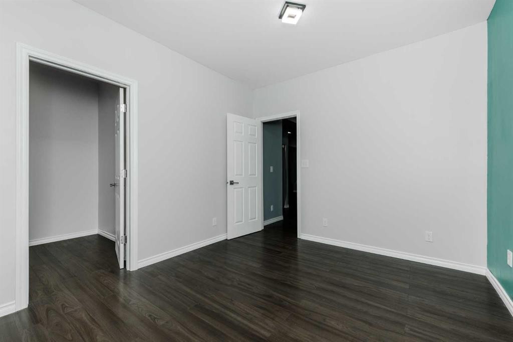 25 Prestwick Pond Terrace Se, Calgary, AB - Indoor Photo Showing Other Room