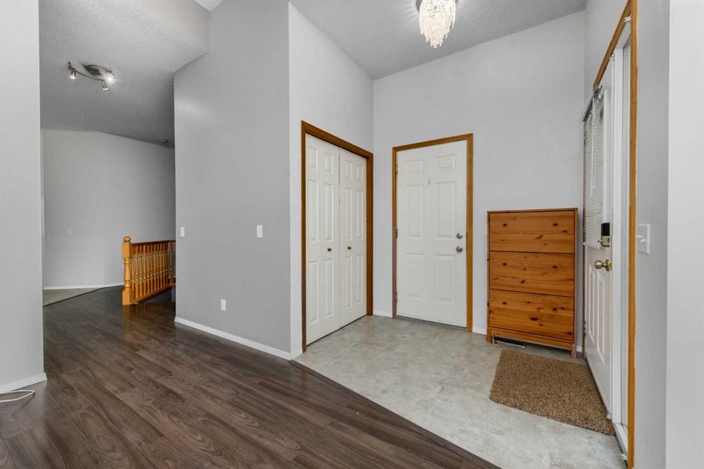 25 Prestwick Pond Terrace Se, Calgary, AB - Indoor Photo Showing Other Room