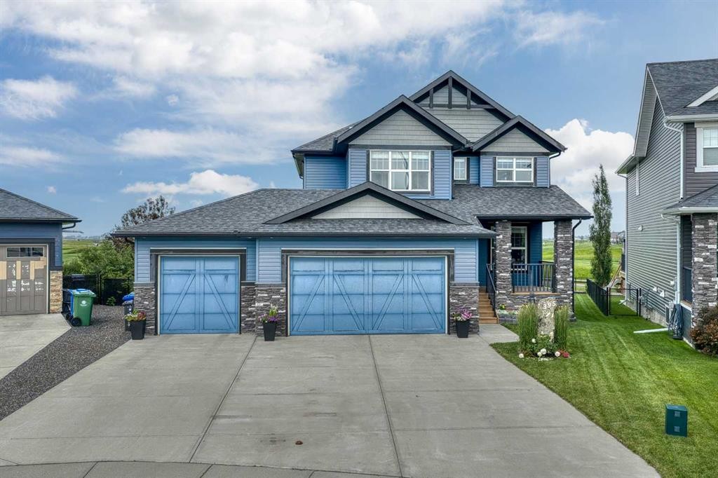395 Boulder Creek Bay Se, Langdon, AB - Outdoor With Facade