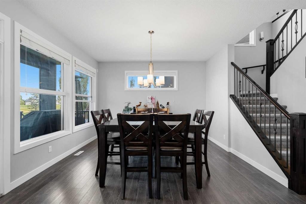 395 Boulder Creek Bay Se, Langdon, AB - Indoor Photo Showing Dining Room