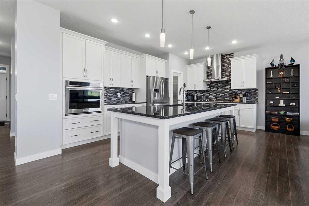 395 Boulder Creek Bay Se, Langdon, AB - Indoor Photo Showing Kitchen With Upgraded Kitchen