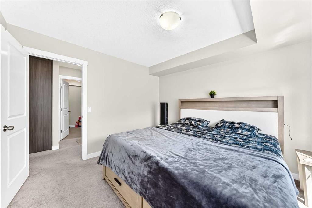 196-300 Marina Drive, Chestermere, AB - Indoor Photo Showing Bedroom