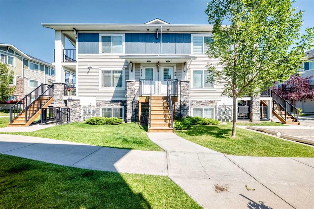 196-300 Marina Drive, Chestermere, AB - Outdoor With Balcony With Facade