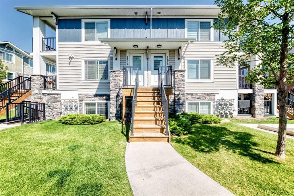 196-300 Marina Drive, Chestermere, AB - Outdoor With Balcony With Facade