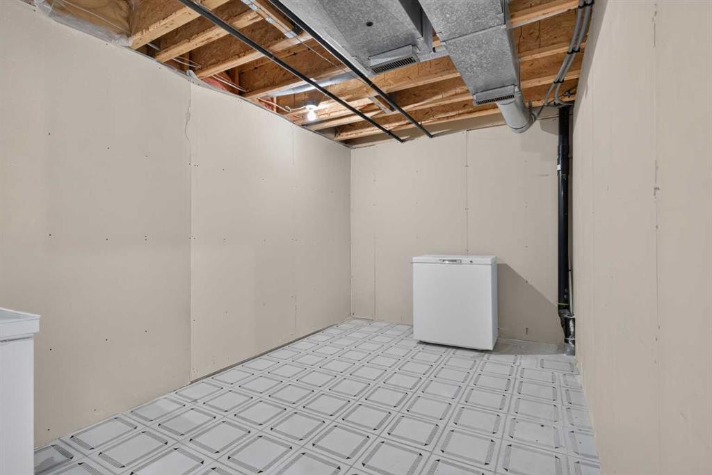 52 Glenbrook Villas Sw, Calgary, AB - Indoor Photo Showing Basement