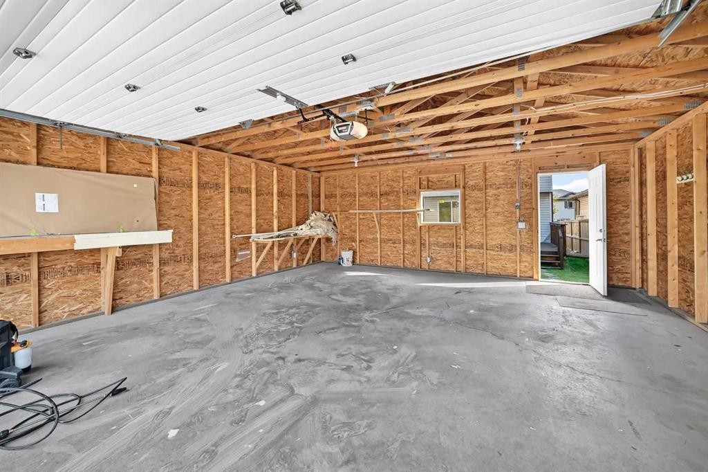 187 Arbour Meadows Close Nw, Calgary, AB - Indoor Photo Showing Garage