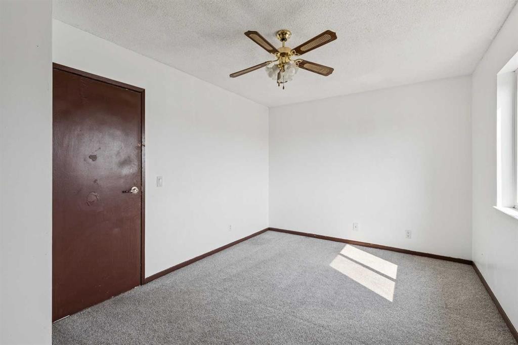 104 Falmere Way Ne, Calgary, AB - Indoor Photo Showing Other Room